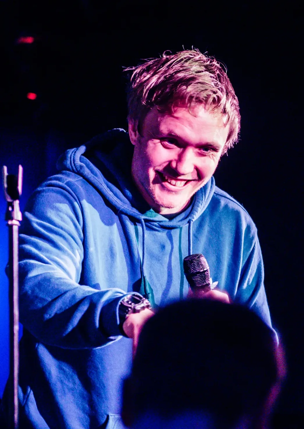 Reece Kidd performing stand-up comedy